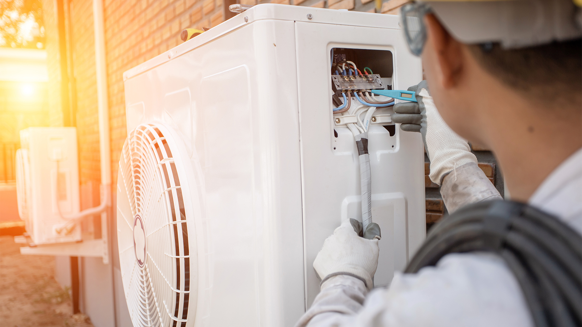 Air Conditioning Technician and A part of preparing to install new air conditioner.